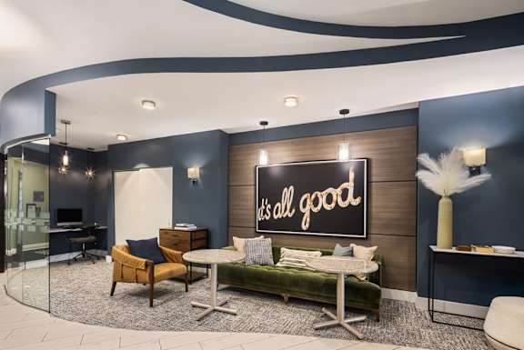 a gym with weights and exercise equipment at the flats  at 15 Bank Apartments, White Plains, NY