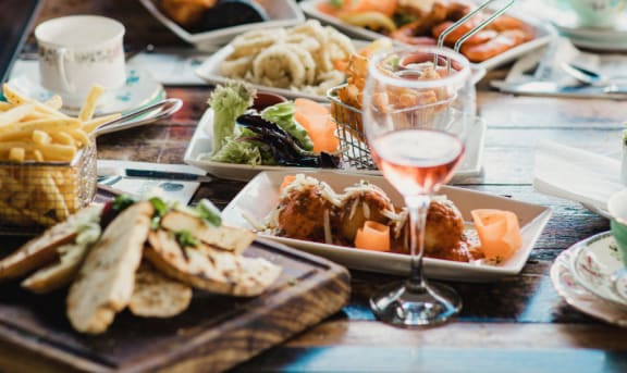 a table full of food at a restaurant