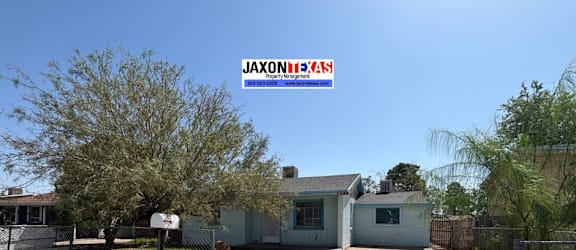 A JAXONEXAS sign is displayed on a blue background with white text.