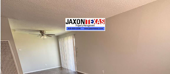 A room with a JAXON HAAS sign on the wall.