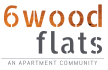 the logo for wood flats an apartment community