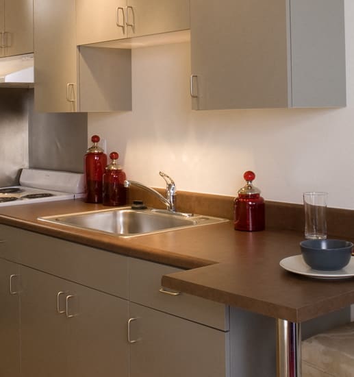 a kitchen with a sink and a stove