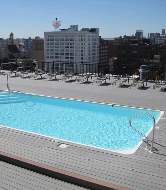 a swimming pool on the top of a building