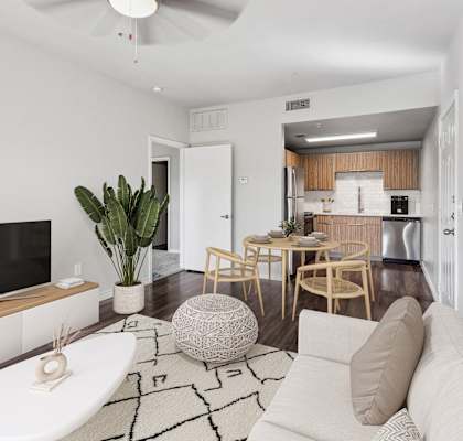 a living room with a couch and a table