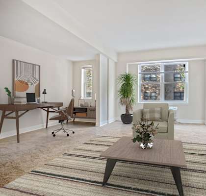 a living room with a couch and a coffee table