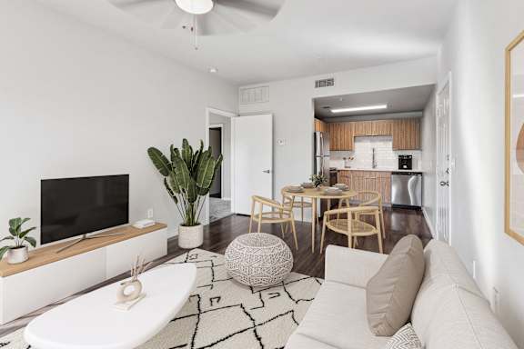 a living room with a couch and a table