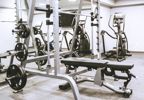 a row of exercise equipment in a gym  at University Glen, University Place, 98466