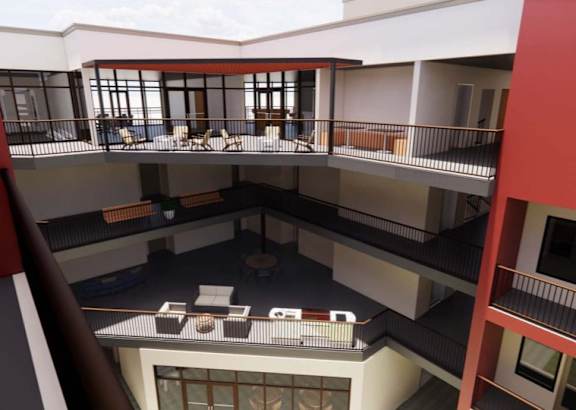 A balcony with chairs and a table is visible from an upper floor. at Vintage at Lockwood Apartments, Oxnard 93036