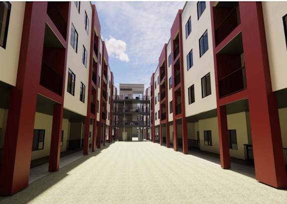 A long hallway with red and white buildings on either side. at Vintage at Lockwood Apartments, Oxnard 93036