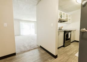 Everett Apartments - Nova North Apartments - Entryway, Living Room, and Kitchen