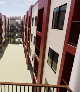 A long hallway with red and white buildings on either side. at Vintage at Lockwood Apartments, Oxnard 93036