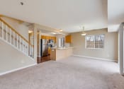 Thumbnail 4 of 22 - empty, carpeted living room