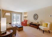 Thumbnail 3 of 22 - Living room with lamps, sofa, and chairs