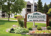 Thumbnail 16 of 21 - Sign that says "Parkside apartments at Medicine Lake" on it with the words "Rental Office" and a left arrow below it