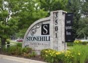 Thumbnail 18 of 23 - Brick sign that says "Stonehill Apartments"