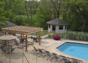 Thumbnail 13 of 23 - Outdoor pool with lounge chairs and sun terrace