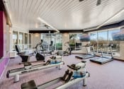 Thumbnail 6 of 23 - Fitness room with various equipment