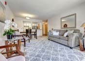 Thumbnail 1 of 26 - Living room with couch and chairs