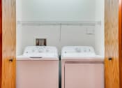Thumbnail 6 of 27 - Washer and dryer behind collapsing closet doors