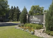 Thumbnail 17 of 19 - Outdoor sign that reads "Woodridge Apartments"