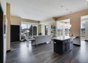 Thumbnail 3 of 42 - Wide shot of living room and kitchen island