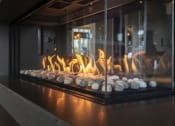 Thumbnail 40 of 42 - Close up of gas fireplace in the lobby