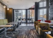 Thumbnail 12 of 42 - Cyber lounge with tables and a variety of seating