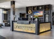 Thumbnail 24 of 42 - Concierge desk with the words "One Southdale Place" written on it