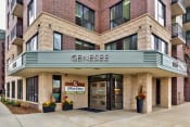 Thumbnail 26 of 29 - outside of entrance to apartment, with sign that says "Genesee"