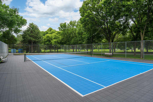 Blue outdoor tennis court