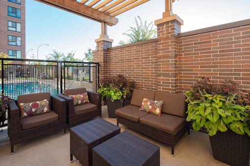 outdoor patio / sun terrace overlooking a pool