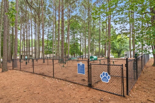 our apartments showcase a dog park with kennels