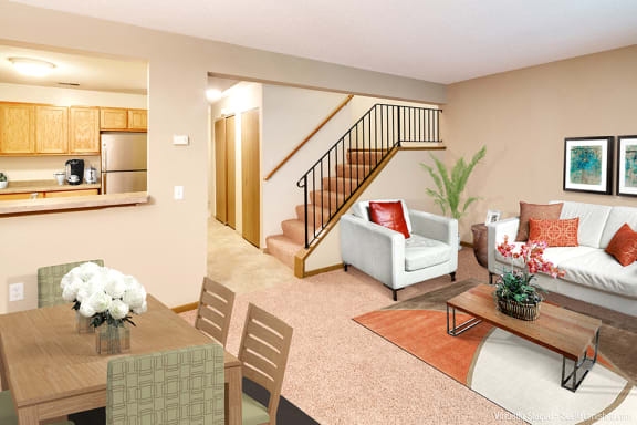 brightly lit living room with dining table, coffee table, white couch with red pillows