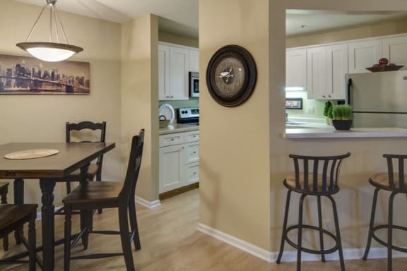 Kitchen and dining room with table and seating