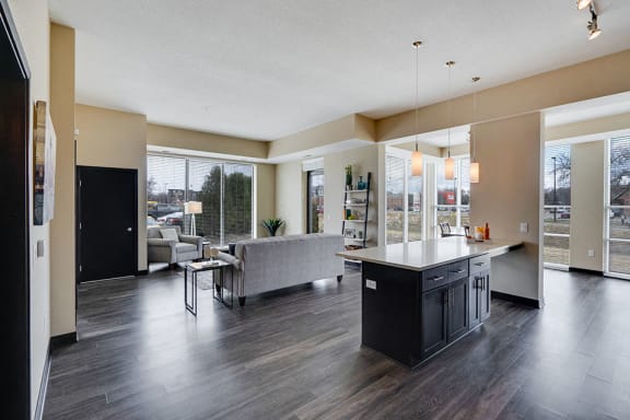 Wide shot of living room and kitchen island