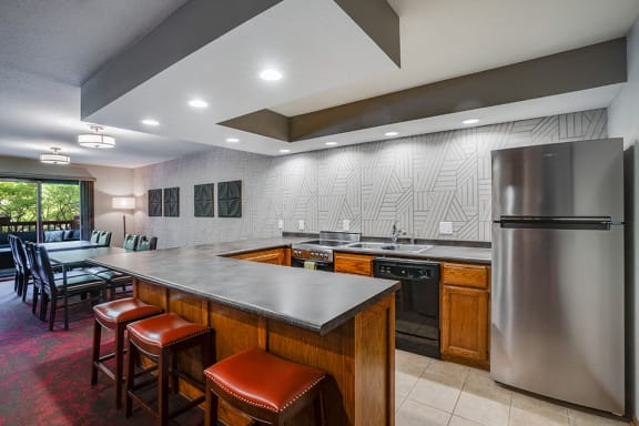 Community room kitchen with a U shaped bar