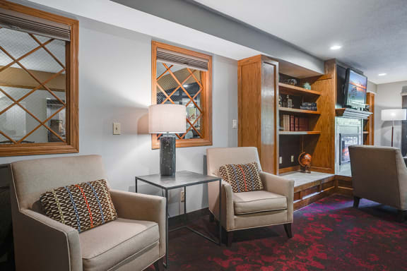 Clubroom with chairs and a bookshelf