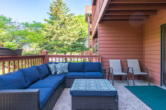 Outdoor patio with blue chairs