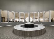 Thumbnail 18 of 22 - Water fountain surrounded by windows