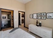 Thumbnail 16 of 42 - Bedroom with connected walk in closet and bathroom