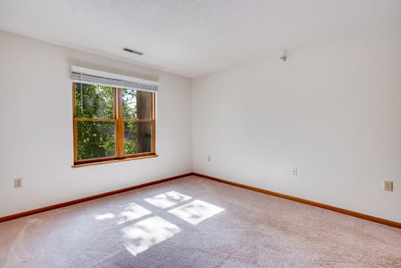 Empty bedroom with a window