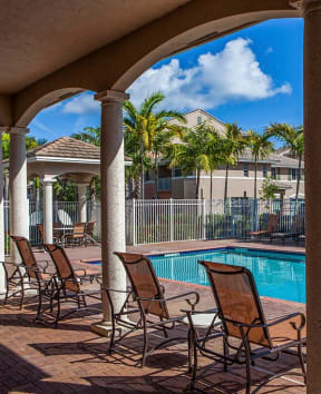 resort style pool with lounge chairs at Preserve at Boynton Beach, Boynton Beach, FL, 33435
