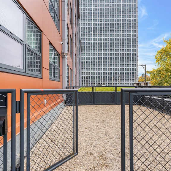 Private balcony with wooden deck and railings at Cedarvale Highlands Apartments, Eagan, 55122
