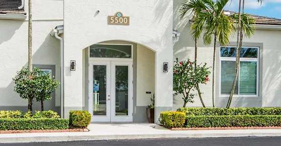 A white building with the number 5500 on it.