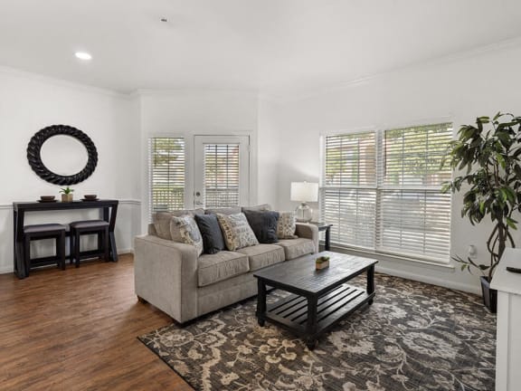 a living room with a couch and a coffee table