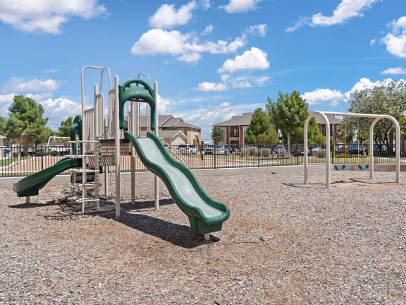 a playground with slides at a park