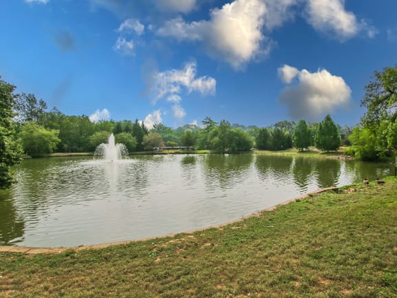apartment building overlooks a lake