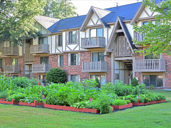 Outdoor community gardens at Woodland Place apartments in Midland, MI