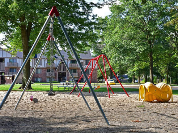 Playground at Woodland Place apartments in Midland, MI