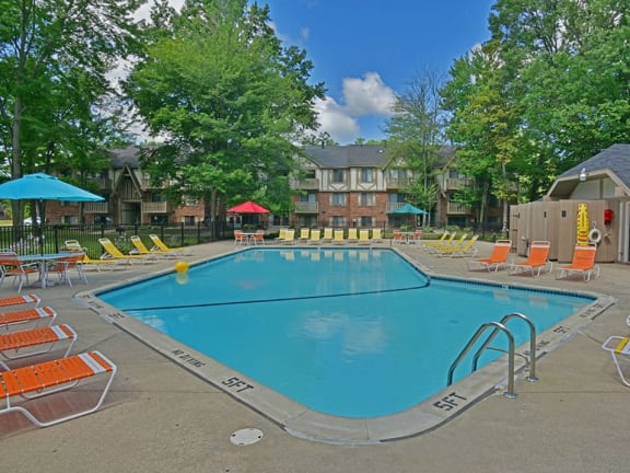 Swimming pool and sundeck at Woodland Place apartments in Midland, Michigan